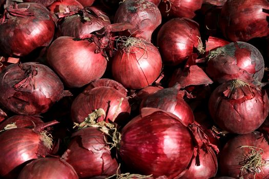 Purple Onions for sale at a market stall