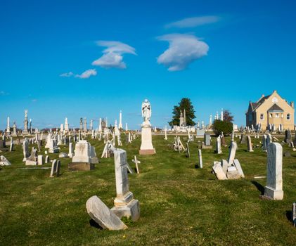 old cemetery with blue sky and cloud
