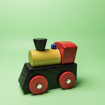 wooden train isolated on green 