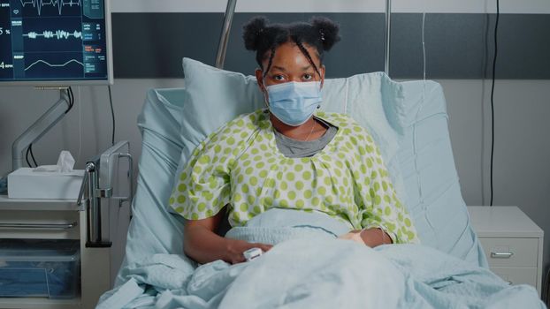 Portrait of patient with sickness wearing face mask