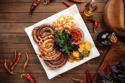 Assorted grilled sausages with sauerkraut