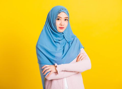 Asian Muslim Arab beautiful woman wear veil hijab crossed arm