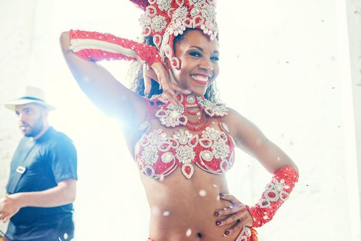 Samba, the sexiest dance ever. Shot of a beautiful samba dancer performing at a carnival.