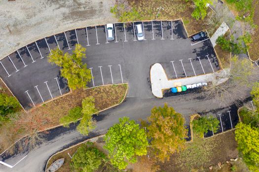 Aerial view from Drone top-down of parking lot  