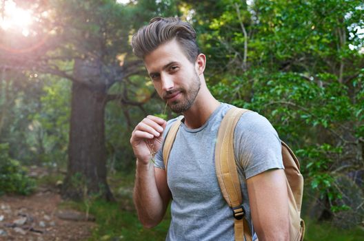 Live a life of passion and adventure. Portrait of a handsome hiker in the forest.