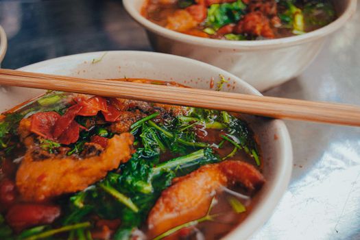 Vietnamese Fried Fish Vermicelli Noodle Soup called Bun Ca