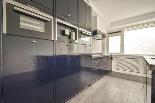 Small kitchen with blue furniture
