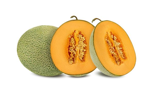 Delicious cantaloupe melon in a cross-section, isolated on white background with copy space for text or images. Side view. Close-up shot.