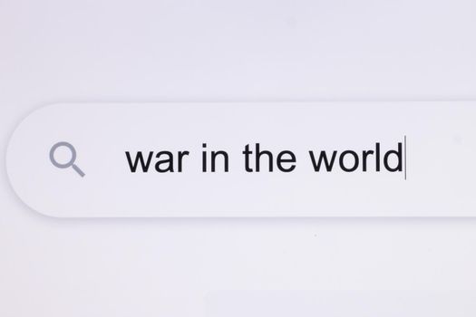 War in the world - Internet browser search bar typing hypotetical world conflict text . Typing the word War in the world in the browser on a pixelated screen