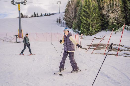 Woman learning to ski with instructor. Winter sport. Ski lesson in alpine school