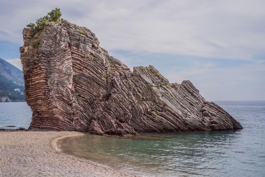 Beautiful rocks in the sea in Montenegro. Montenegro is a popular tourist destination in Europe