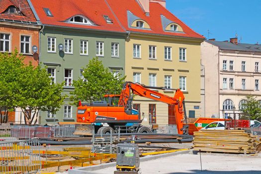 Poznan, Poland, August 15, 2020: construction machinery on the city street. Road repair