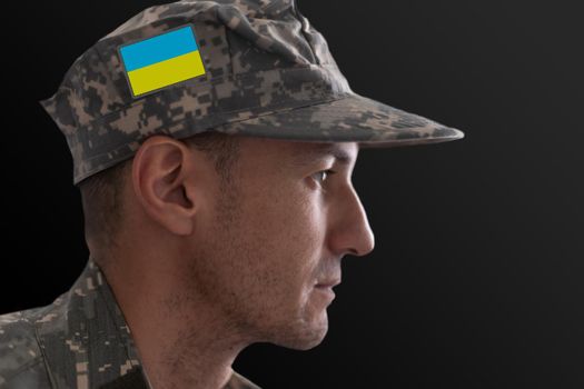 Ukrainian soldier. Ukrainian in army. Ukrainian flag on military uniform. Troops of Ukraine