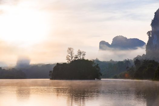 Ban Nong Thale the natural scenery of the sunshine in the morning (mountains, lakes, trees, fog), Thailand.