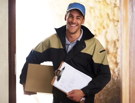 We never disappoint with our delivery service. Portrait of a courier delivering a package.