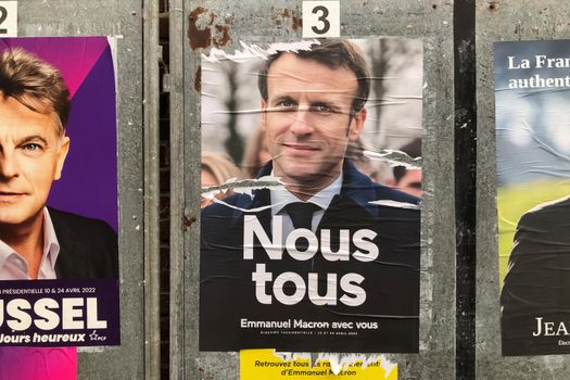 PARIS, FRANCE - APRIL 06, 2022 : The banners with candidates for President elections 2022