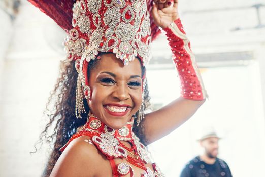 The highlight of every Rio Carnival. Shot of a beautiful samba dancer performing at a carnival.