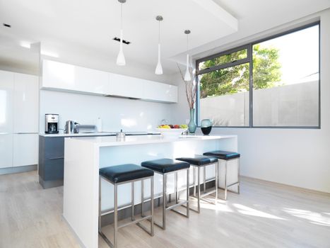 Modern kitchen for modern living. Open plan kitchen area in a modern minimalist style home.