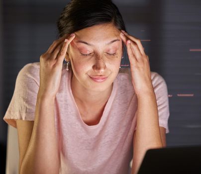 I cant think straight anymore. Shot of a young woman looking stressed as she studies.