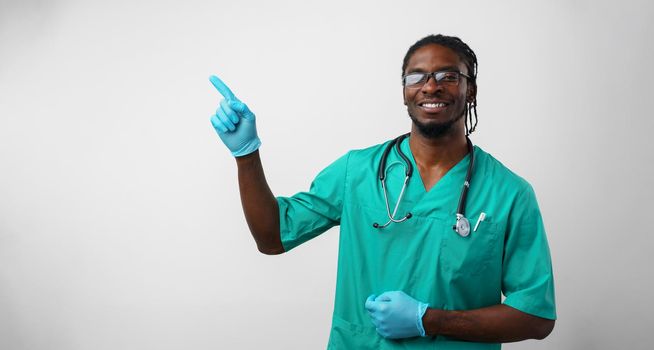 Afro american doctor pointing with hand and finger to the side
