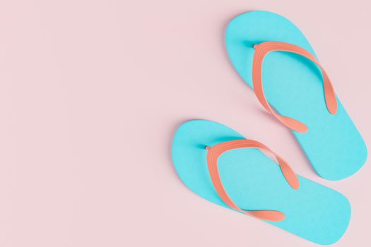 pastel colored flip flops with copy space