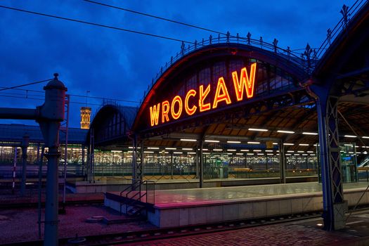 Platform of Wroclaw Glowny railway station at dusk