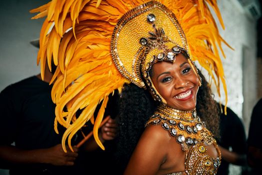 I just love to dance. Cropped portrait of a beautiful samba dancer performing in a carnival with her band.