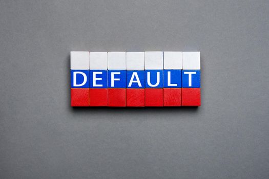 Wooden cubes text concept default blocks stack Russian federation crisis. Cubes default text isolated flag of Russia concept. Made of block letters wood word default in Russian flag cubes stacked sign