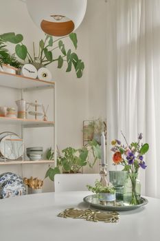 Home decoration using flowers, dishes