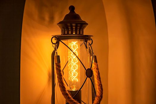 Close up of old fashioned modern lantern with led lights. Vintage decoration home