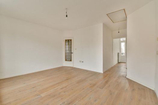 A spacious empty room with an angular interior