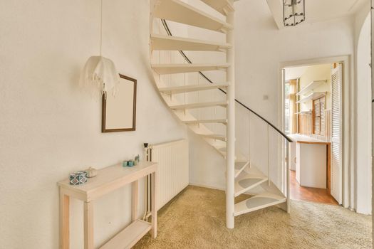 Spiral white staircase leading up