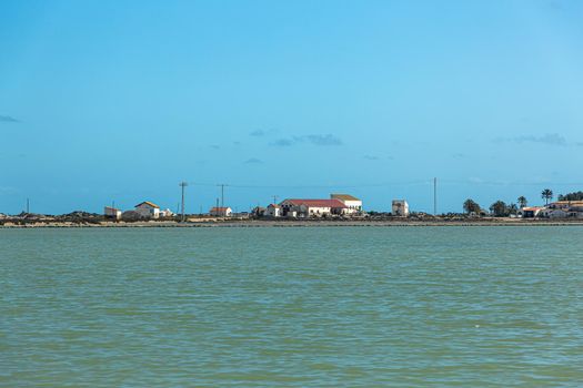 Salt extraction plant on the shore of the salt lake. Mediterranean
