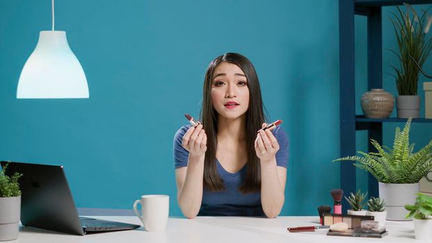 POV of asian influencer doing lipstick recommendation