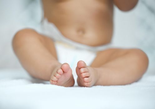 Tiny and sweet baby feet. Closeup shot of an adorable babys feet.
