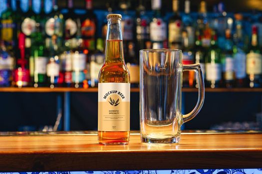 Beer bottle mock-up against blurred bar counter