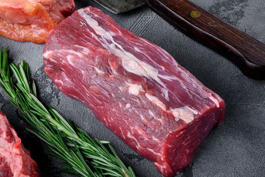 Fresh and raw fillet meat. Whole piece of beef tenderloin steaks, on gray stone background