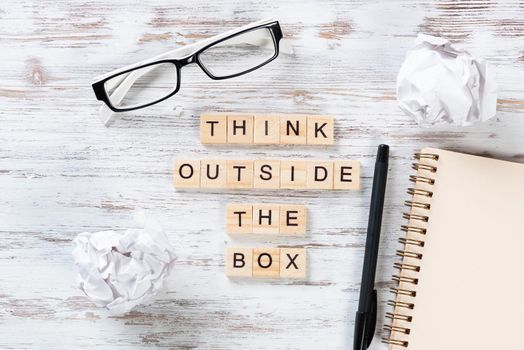 Think outside the box quote with letters