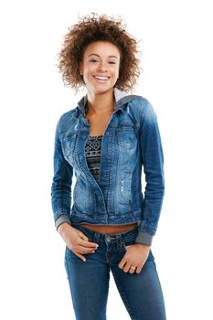 Yes I love denim. How could you tell. Studio portrait of a confident young woman dressed in denim posing against a white background.