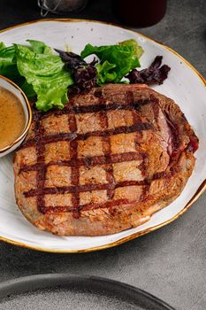 Grilled beef steak with pepper sauce