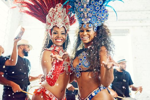 For the love of samba. Shot of beautiful samba dancers performing at a carnival.