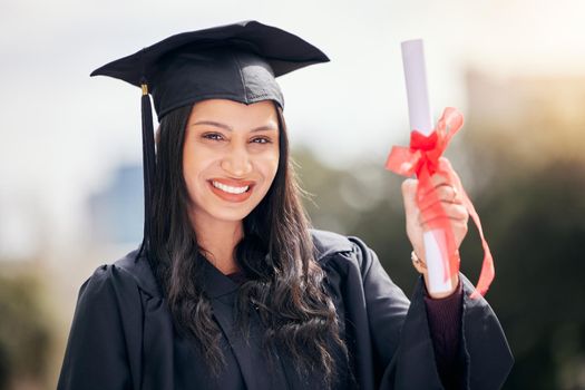 I worked really hard for this. Cropped portrait of an attractive young female student celebrating on graduation day.