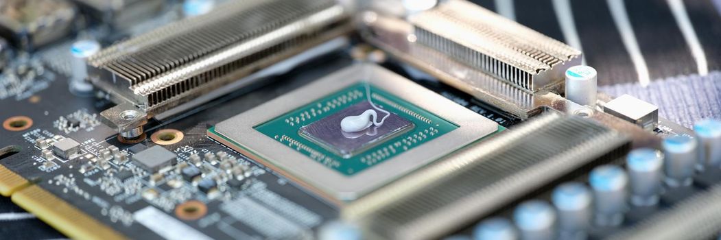 Cpu microchip processor with thermal paste closeup