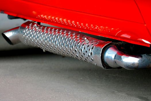 Large exhaust pipe of a powerful car, pickup truck.