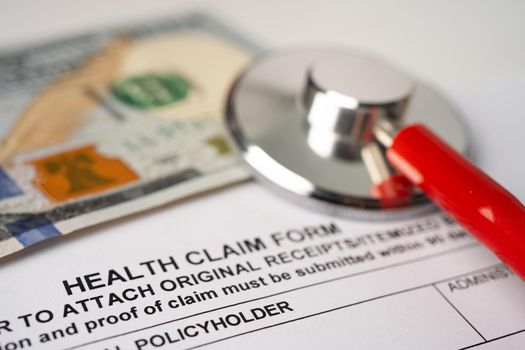 Health insurance accident claim form with stethoscope, Medical concept. 
