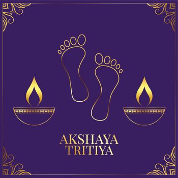 akshaya tritiya greeting with diya and goddess feet