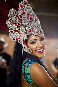 Shes got that spellbinding beauty. Portrait of a samba dancer performing in a carnival.