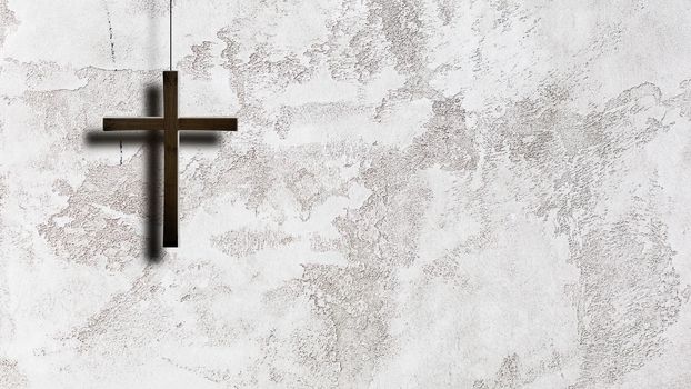 Christian wooden cross on the white and grey wall with the lighting.