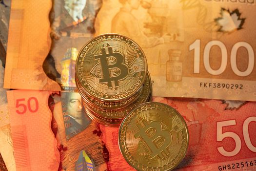Bitcoin on modern Canadian polymer banknotes. Trading Bitcoin with Canadian Dollar