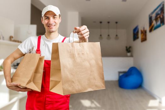 man with food delivery packages